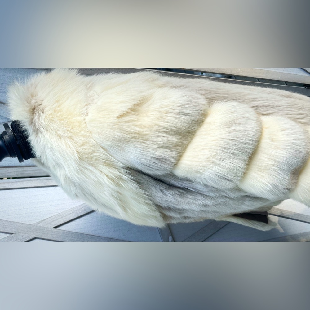 Whitish real fur coat